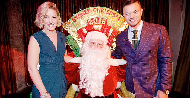 Jules and Guy Sebastian have a photo with Santa as they launch Sydney's Christmas celebrations for 2015
