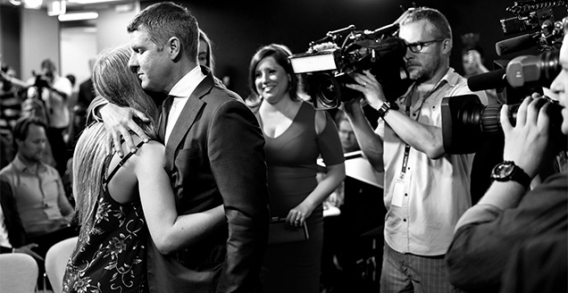 Mike Baird hugs his youngest daughter Kate