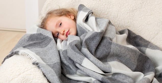 Sick girl on couch