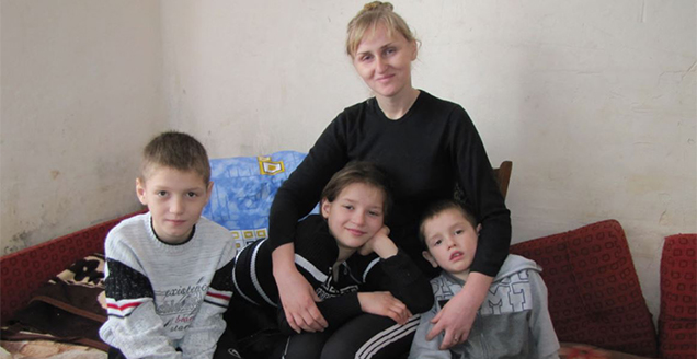 Tetyana Nazarevych and her three children in the Ukraine