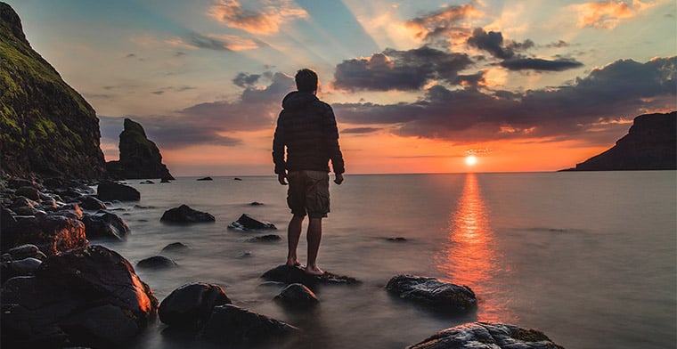 Man on beach at Dawn