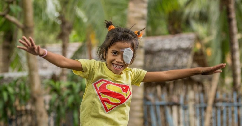 marjil celebrates a successful eye surgery