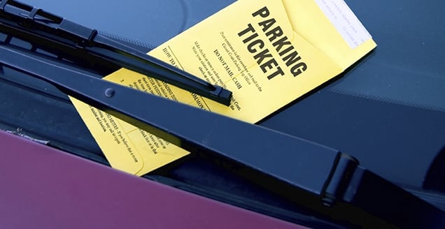 Parking Ticket On Purple Car