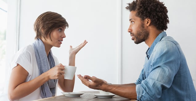 Couple chatting over coffee