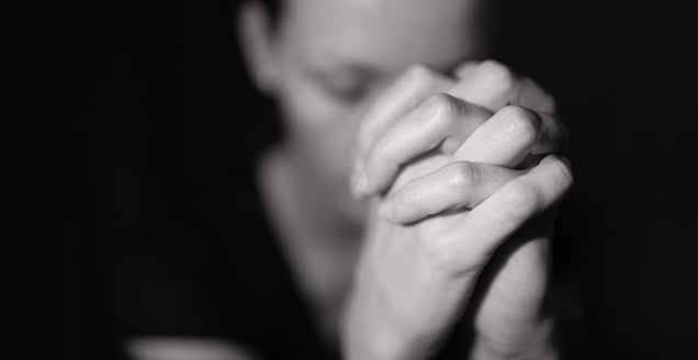 Woman In Prayer