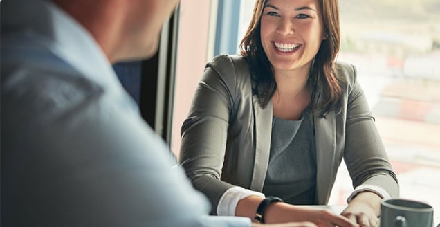 Man and woman working together in office