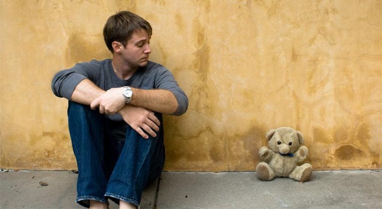 Man and teddybear