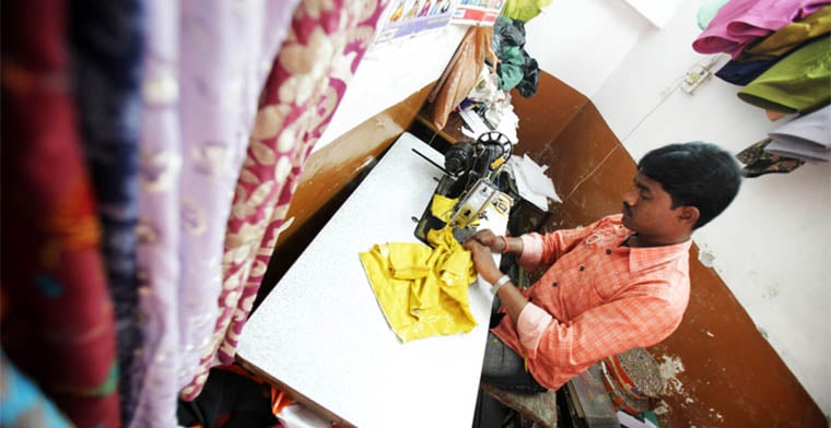Indian worker making garments