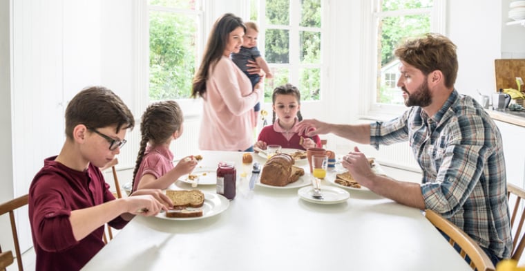 Family having breafkast before school