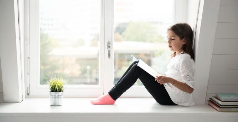 Girl reading at home