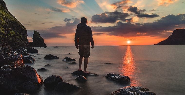 Man Looking at Sunrise