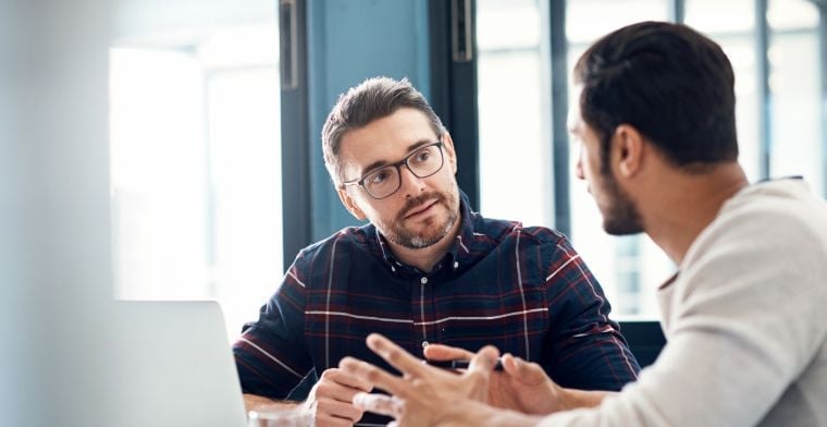 two men talking