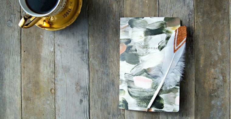 Journal and coffee