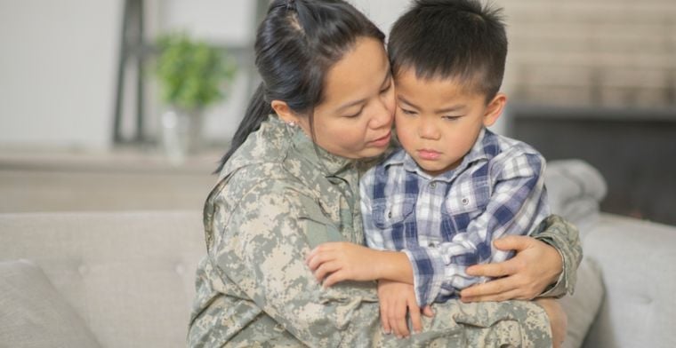Mum hugging little boy