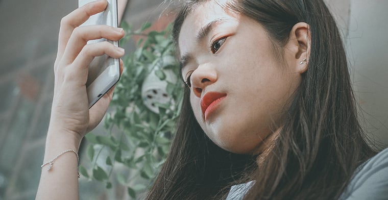 teen girl and iphone