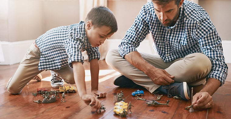 Dad playing games with son