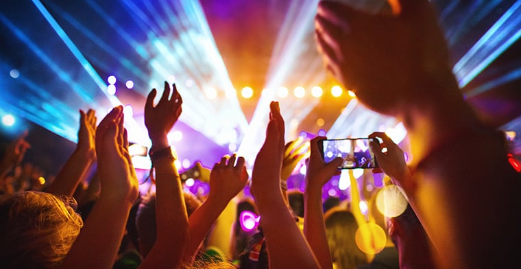 Cheering crowd at a concert.