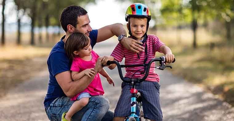 Young father with his kids spending a day outside