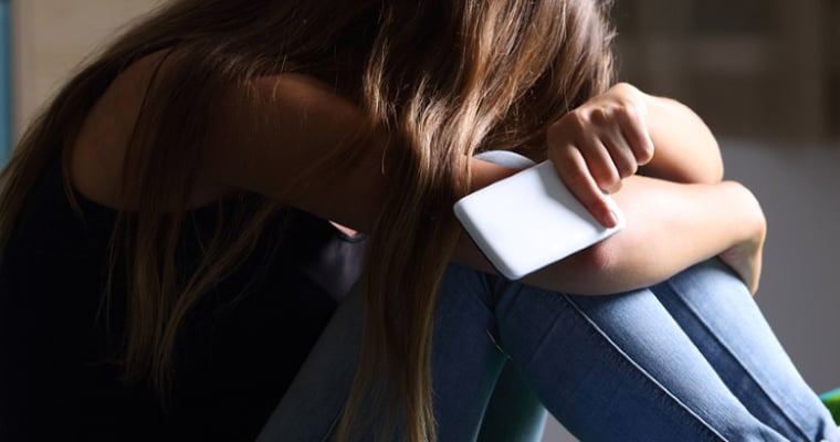 Teen Girl with phone stressed