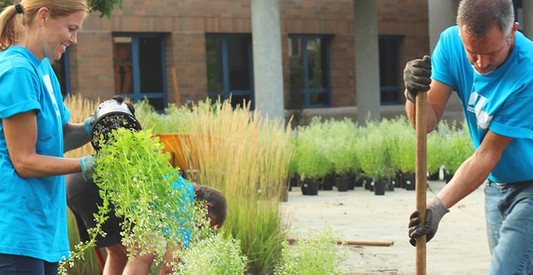 volunteers working in garden