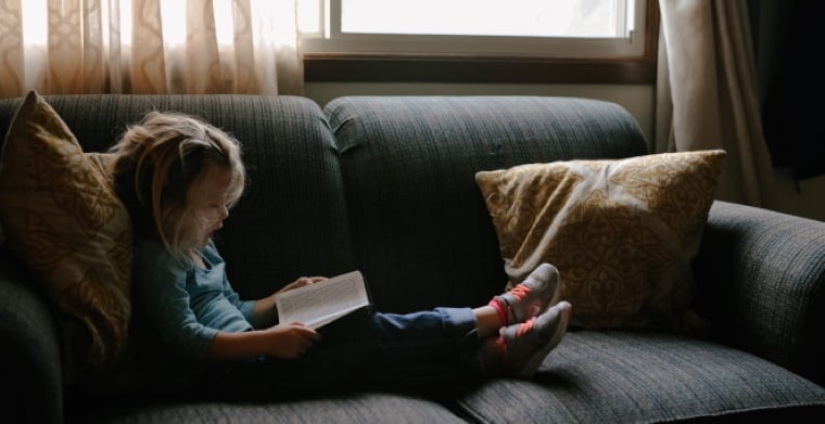Little girl reading josh-applegate-