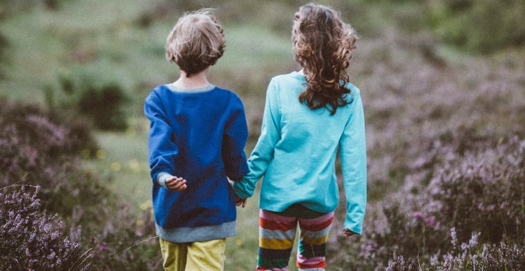 brother and sister out walking