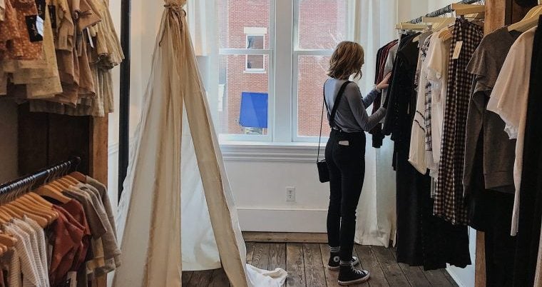 Young woman shopping for clothes