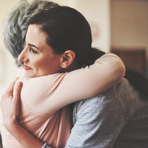 Forgiveness; two women hugging, reconciling