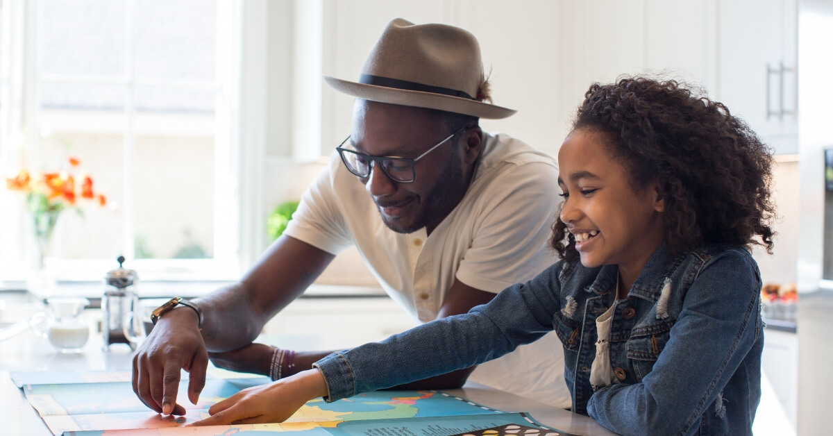 dad doing an activity with his daughter