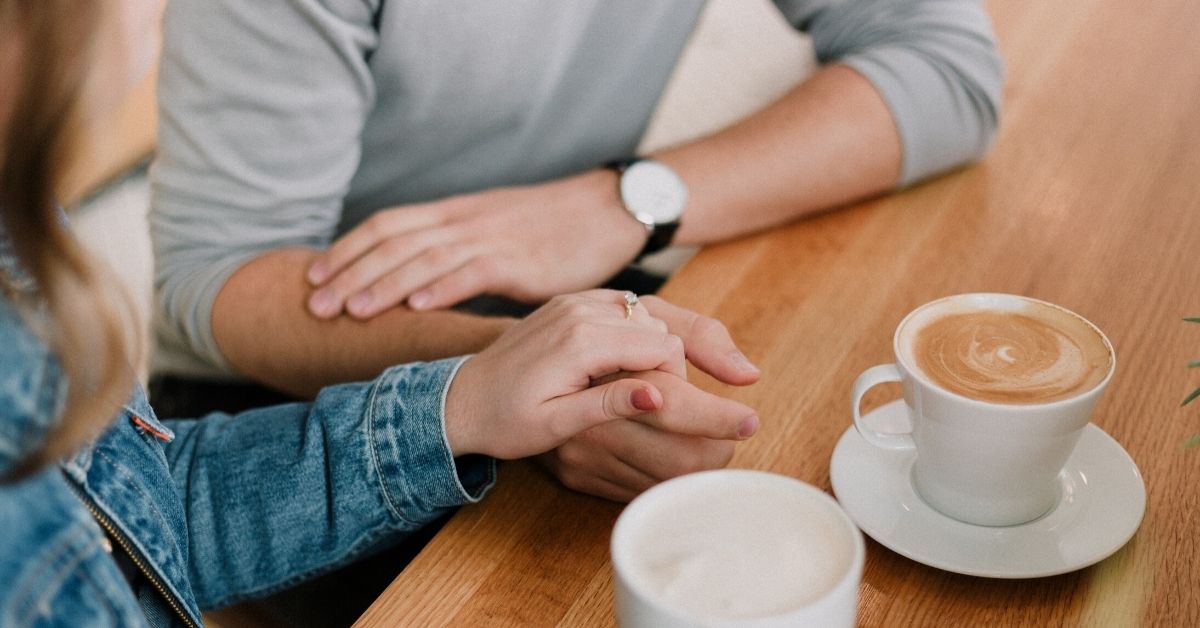 couple having a conversation over coffee