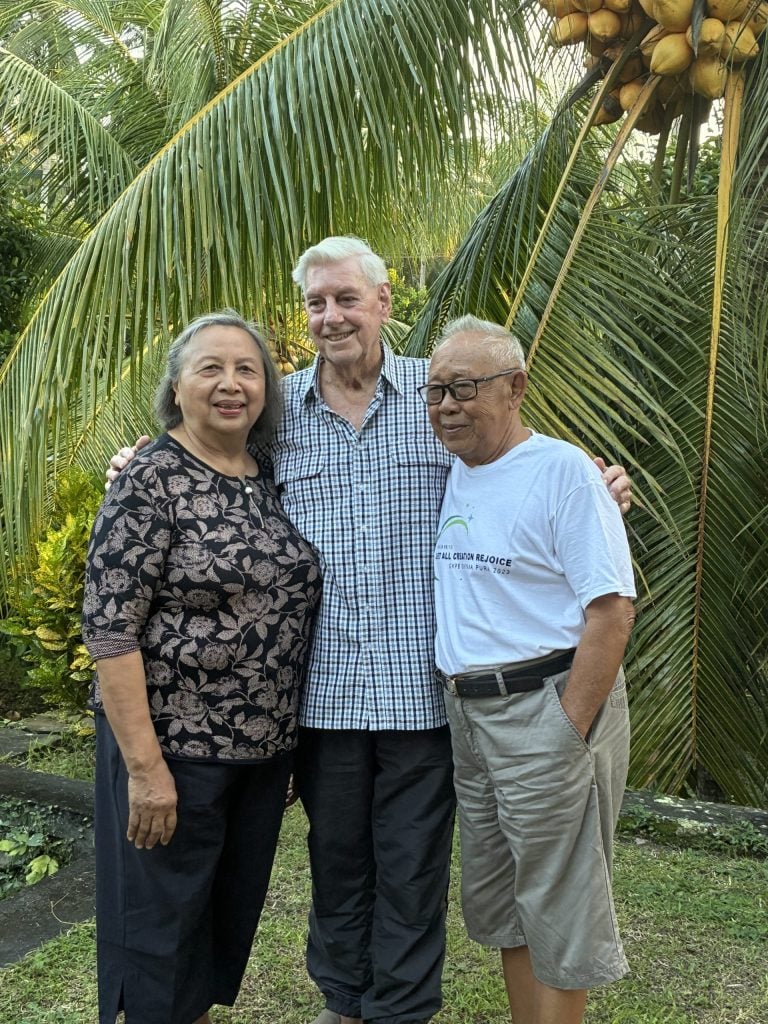 Opportunity International Australia cofounder David with Ketut and Putu